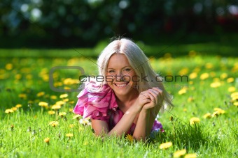 girl on dandelion field