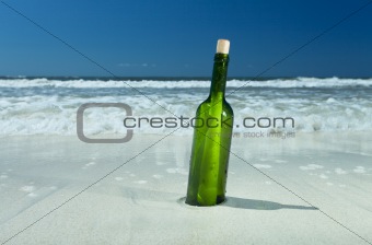 message in a bottle on a beach 
