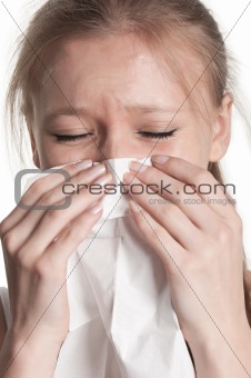 Pale Woman Sneezing