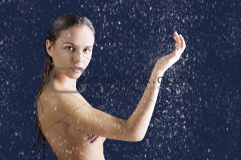 beauty girl with wet skin with raised arm