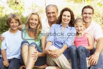 Extended Group Portrait Of Family In Garden