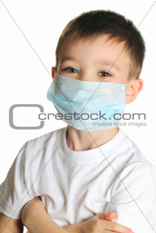 Boy in medicine mask