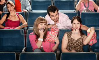 Sharing Popcorn in a Theater
