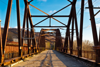 Old Rusty Bridge across Volga River near Samara, Russia