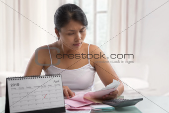 Housewife working on tax report