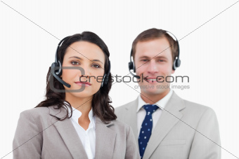 Young call center agents standing together