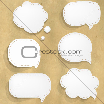 Cardboard Structure With White Paper Speech Bubbles
