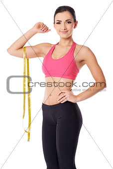 Slim woman with a tape measure