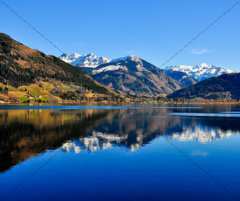 Blue mountain lake landscape view with mountain reflection