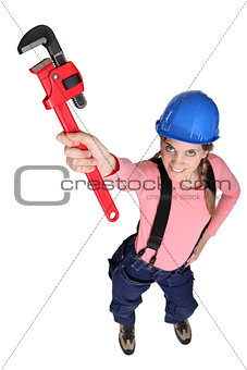 Women holding a wrench