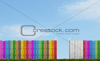 Colorful wooden fence with open gate