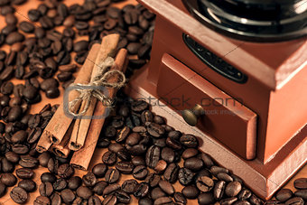 coffee mill and cinnamon sticks