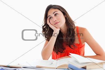 Smiling student doing her homework