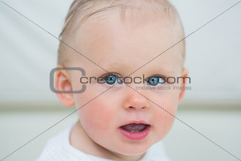 Close up of a baby having blue eyes