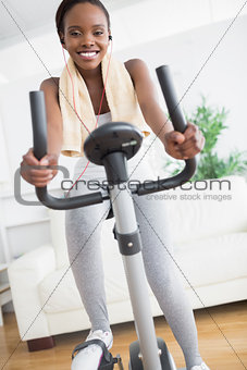 Black woman smiling while doing sport