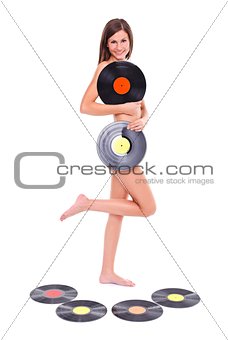 Nude girl with vinyl discs
