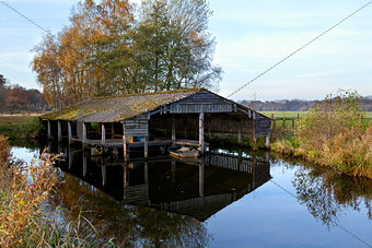 wooden fisherman hut on water