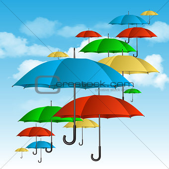 Colorful umbrellas flying high.