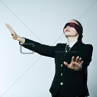 blindfold business woman