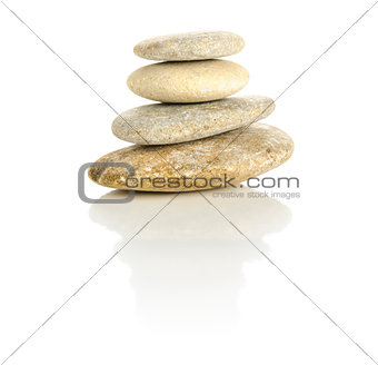 Four stones stacked in a pyramid