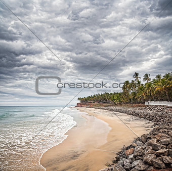 Tropical beach with dramatic sky
