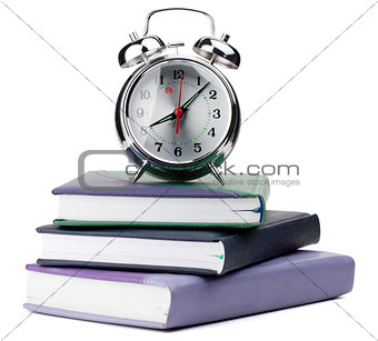 Alarm clock on notepads