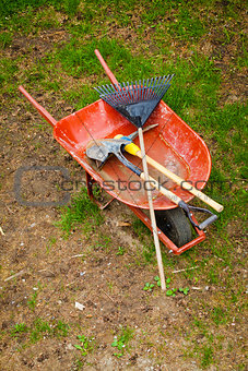 Old Wheelbarow with gardening tools