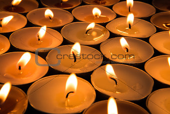 Many candles burning