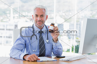 Doctor holding medicine jar
