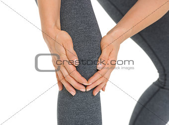 Closeup on woman with knee pain