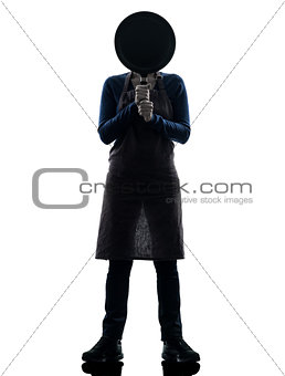 woman cooking hiding behind frying pan silhouette