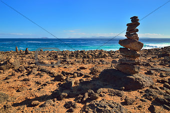 Stack of stones on cliff. Lanzarote, Canary Islands. Stack of st