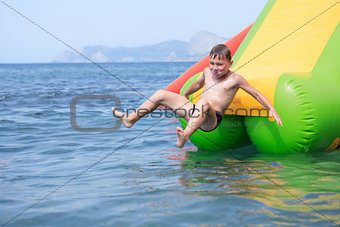 Boy On Water Slide
