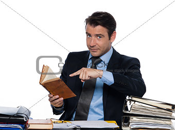 Man teacher reading pointing book