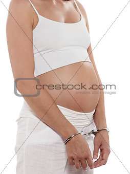 Pregnant Woman Hands attached with handcuffs