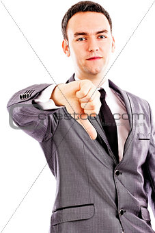 Disappointed young business man showing thumb down sign