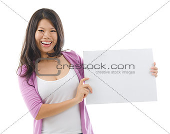 Asian woman showing a blank card board