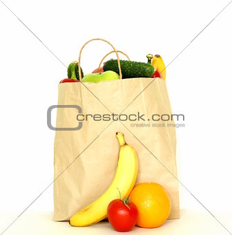 set of different convenience food (vegetables fruit) in a paper bag