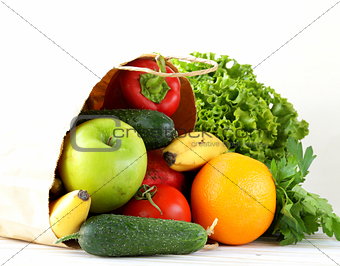 set of different convenience food (vegetables fruit) in a paper bag