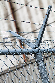 Outdoor Fence Detail of Sharp Barbwire Installation