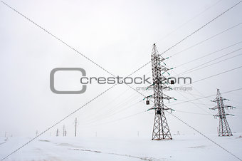 power line near the road in winter