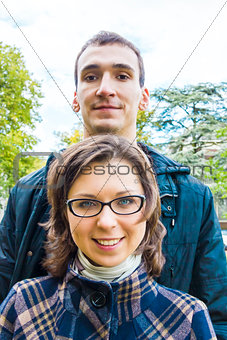 Portrait of love couple  outdoor looking happy