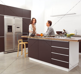 couple in the modern kitchen