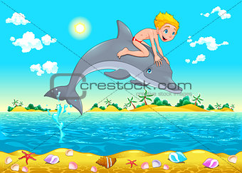 The boy and the dolphin in the sea.