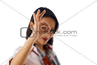 Portrait of asian woman showing ok sign at camera
