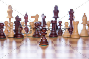 Chessboard with the focus on the pawn standing in the front