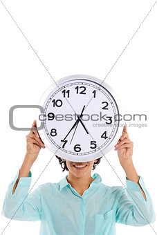 hipanic woman holding big clock on her face