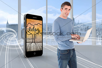 Composite image of man using a laptop
