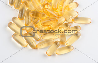 Omega 3 gel capsules on white background