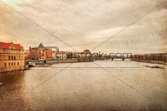 Prague. Vltava. Czech Republic. View from Charles Bridge, textured old paper